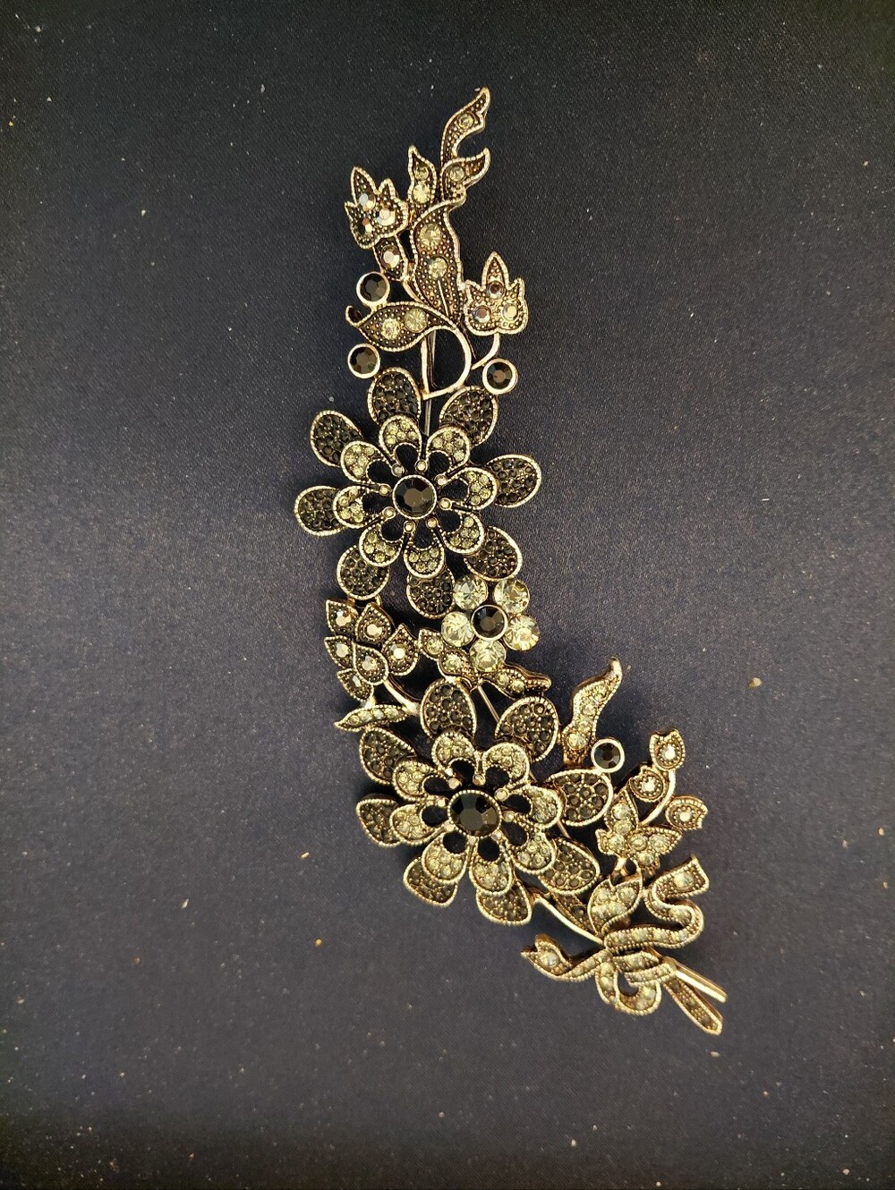 Avon Silver-Tone Floral Filigree Brooch with Black Accents